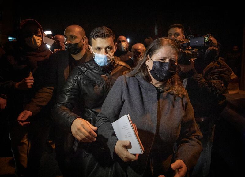 Marwan Barghouti's wife, Fadwa, leaves the election commission office after registering her husband's list for the parliamentary election, in Ramallah. Mr Barghouti, a popular Palestinian uprising leader jailed by Israel has submitted an independent list of candidates to run in the coming parliamentary elections. AP