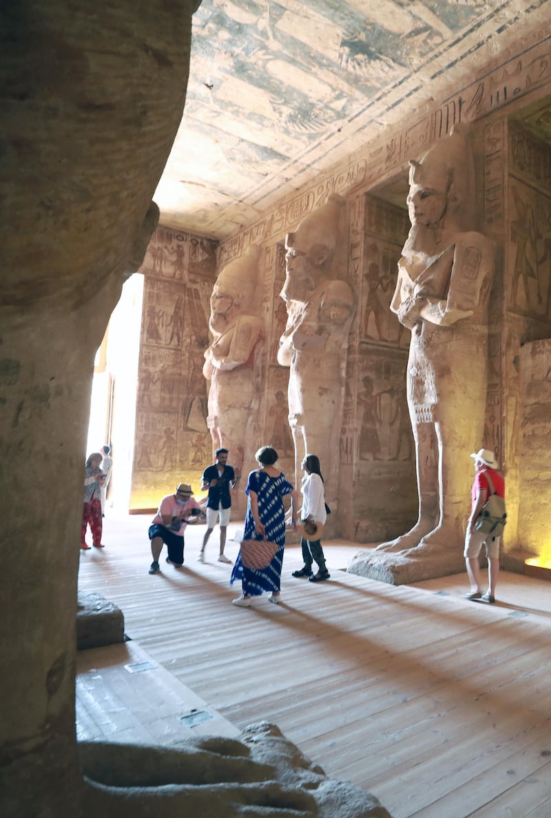 People visit the Ramses II temple in Abu Simbel, Egypt. Tourism in Egypt is reeling under the impact of Covid-19 pandemic. EPA