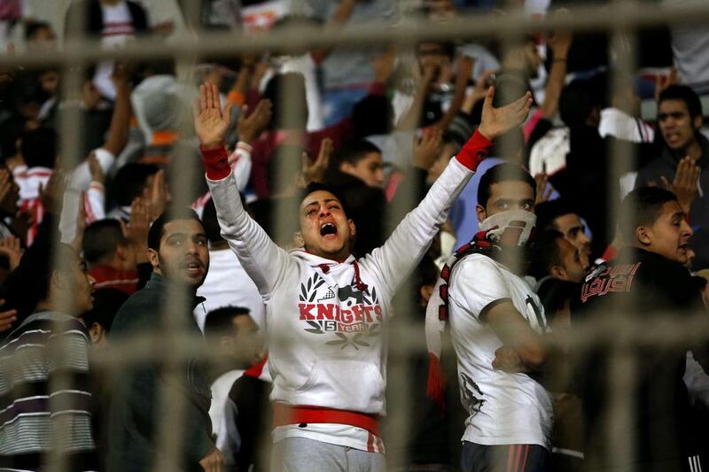 An ultras White Knights fan cries during a match between Egyptian Premier League clubs Zamalek and ENPPI at Cairo's Air Defense Stadium. Ahmed Abd El Gwad, El Shorouk Newspaper/AP Photo