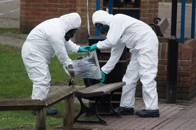 epa06623858 Army officers remove the bench, where Sergei Skripal and his daughter were found, in Salisbury, Wiltshire, Britain, 23 March 2018. Former Russian spy Sergei Skripal, who lived in Salisbury and his daughter Yulia were found suffering from extreme exposure to a rare nerve agent in Salisbury on 04 March 2018. Skripal and his daughter Yulia remain in a 'very serious' condition.  EPA/WILL OLIVER