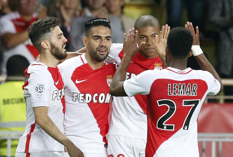 Radamel Falcao, second left, is enjoying an impressive revival and has been integral to Monaco's free-scoring brand of football. Sebastien Nogier / EPA