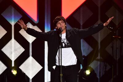 English singer Louis Tomlinson performs onstage during the KIIS FM's iHeartRadio Jingle Ball at the Forum Los Angeles in Inglewood, California on December 6, 2019. / AFP / Frederic J. BROWN
