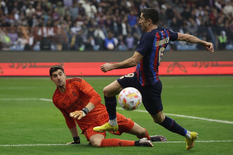 REAL MADRID RATINGS: Thibaut Courtois 7 – The Belgian was by far the busier of the two keepers. He could do little about any of the goals, and was left stranded by his defenders in two of them. Made some terrific saves, the best denying Lewandowski and Dembele. AFP