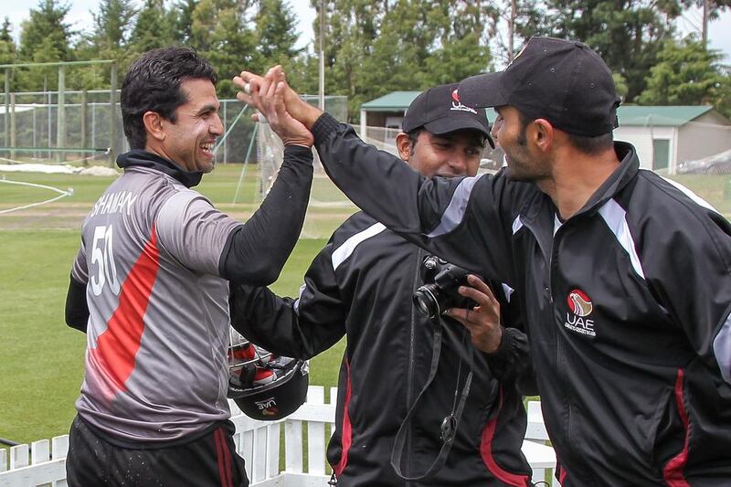 Shaiman Anwar of UAE celebrates after scoring 109 runs during the ICC Cricket World Cup qualifier against Nepal on Monday in Rangiora, New Zealand.  Martin Hunter-IDI/IDI via Getty Images