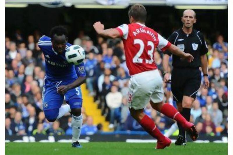 Chelsea’s Michael Essien challenges Arsenal’s Andrey Arshavin in Chelsea’s 2-0 home victory in October.