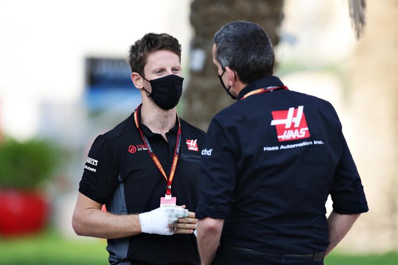 Haas team principal Guenther Steiner and Romain Grosjean in the paddock before final practice ahead of the Sakhir Grand Prix at the Bahrain International Circuit on Saturday. Getty
