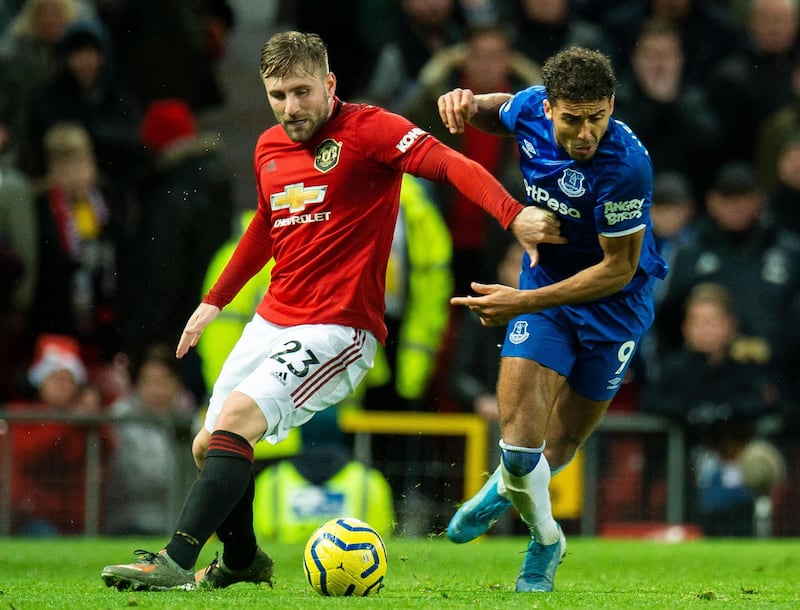 Manchester United's Luke Shaw (L) in action with Everton's Dominic Calvert-Lewin. EPA