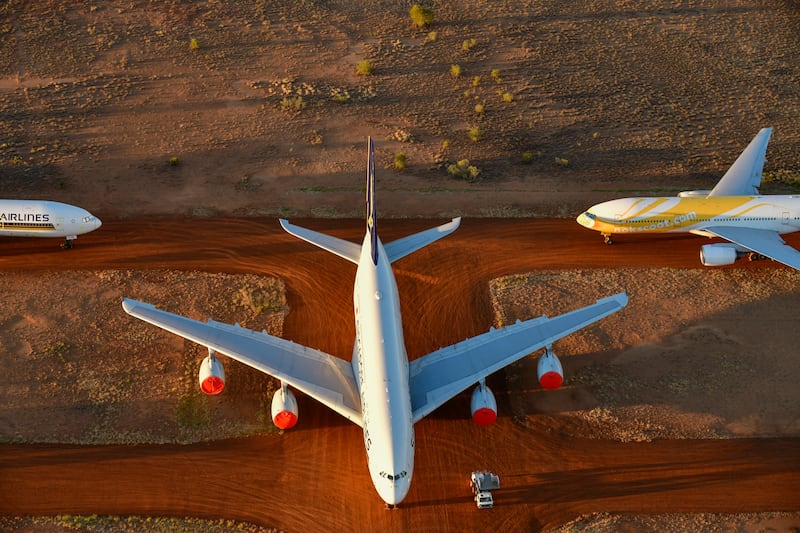 Grounded planes, which include Airbus A380s, Boeing Max 8s and other smaller aircraft, at the Asia Pacific Aircraft Storage complex in Alice Springs, Australia. Getty