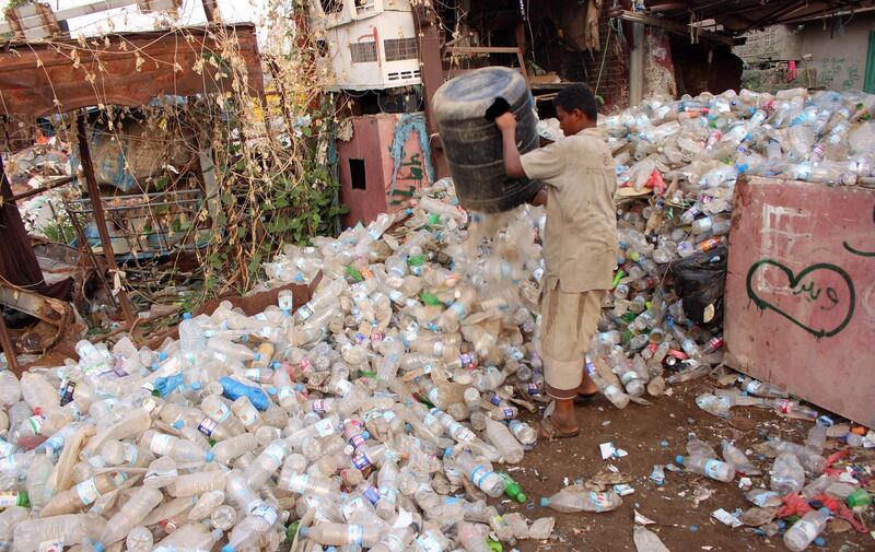 A Yemeni man collects recyclable items near a rubbish dump in the Abs district of the northwestern Hajjah province. AFP
