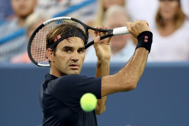 MASON, OH - AUGUST 18: Roger Federer of Switzerland returns a shot to David Goffin of Belgium during the semifinals of the Western & Southern Open at Lindner Family Tennis Center on August 18, 2018 in Mason, Ohio.   Matthew Stockman/Getty Images/AFP
== FOR NEWSPAPERS, INTERNET, TELCOS & TELEVISION USE ONLY ==
