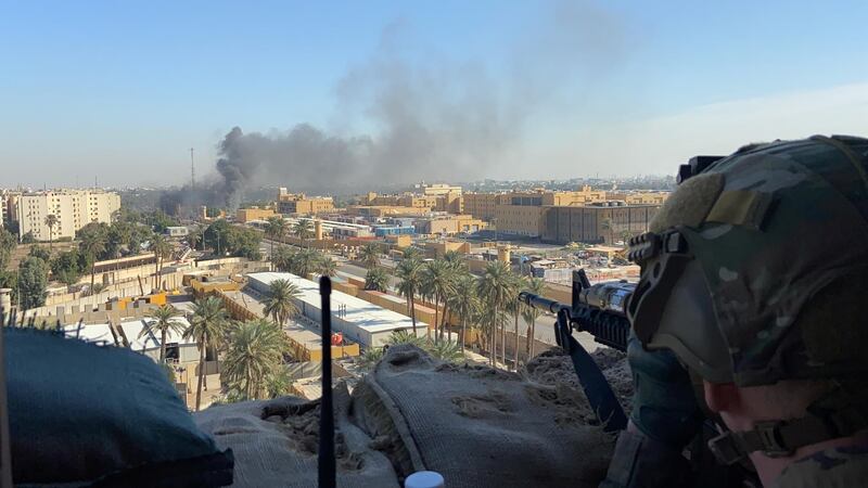 A US soldier mans an observation post at Forward Operating Base Union III in Baghdad. Reuters