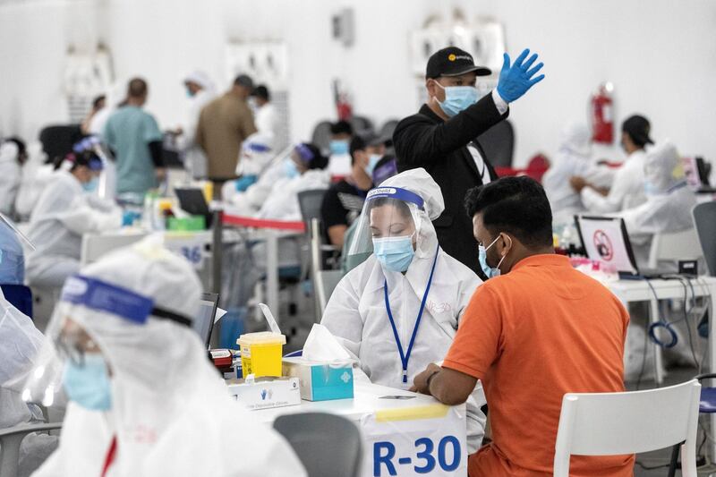 ABU DHABI, UNITED ARAB EMIRATES. 05 AUGUST 2020. The DPI Screening facility along the border between Dubai and Abu Dhabi which screens travellers for the COVID-19 virus using a blood sample and laser technology. It is a quick blood test and results are out in a matter of minutes. (Photo: Antonie Robertson/The National) Journalist: Nick Webster. Section: National.