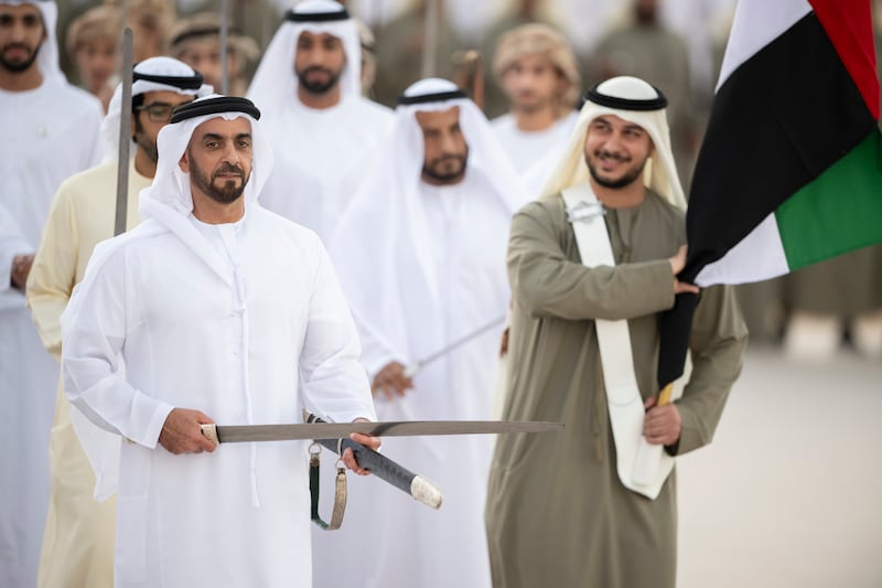 Lt Gen Sheikh Saif bin Zayed, Deputy Prime Minister and Minister of Interior, participates in a traditional ayyala during the Union Parade. Abdullah Al Junaibi for the Presidential Court 