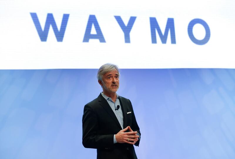 FILE - In this Sunday, Jan. 8, 2017, file photo, John Krafcik, CEO of Waymo, the autonomous vehicle company created by Google's parent company, Alphabet speaks at the North American International Auto Show in Detroit. The executive who steered the transformation of Googleâ€™s self-driving car project into a separate company worth billions of dollars is stepping down after more than five years on the job. Krafcik announced his departure as CEO of Waymo, a company spun out from Google, in a Friday, April 2, 2021, blog post that cited his desire to enjoy life as the world emerges from the pandemic. (AP Photo/Paul Sancya, File)