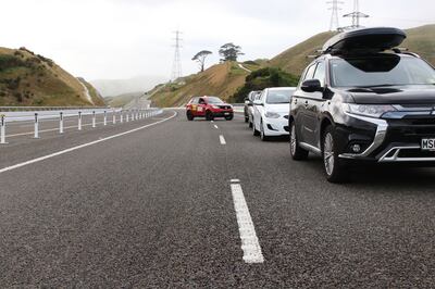 A roof box on top of your car will increase drag and burn even more fuel. Getty