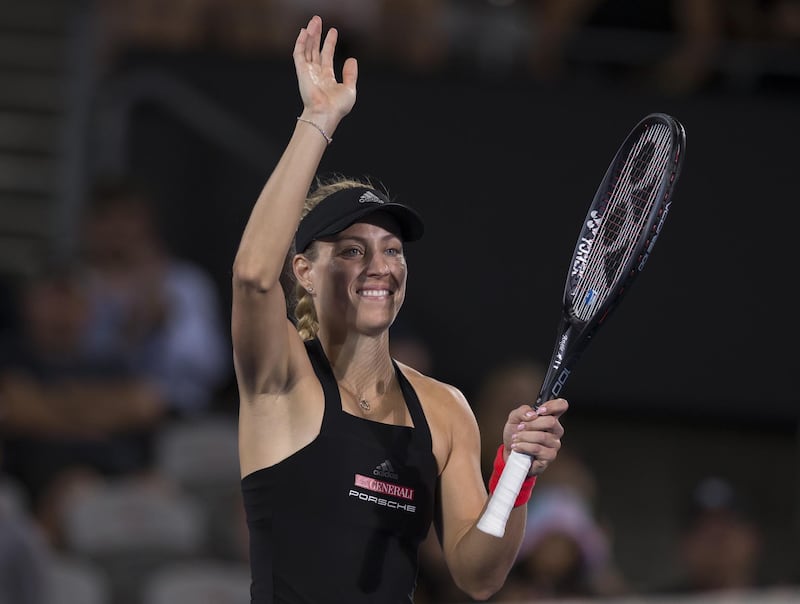 epa07269072 Angelique Kerber of Germany celebrates after winning her match against Camila Giorgi of Italy at the Sydney International tennis tournament at Sydney Olympic Park Tennis Centre in Sydney Australia, 08 January 2019.  EPA/CRAIG GOLDING AUSTRALIA AND NEW ZEALAND OUT