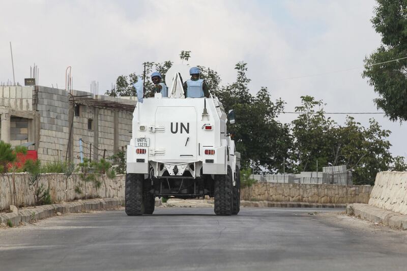 Ghanaian peacekeepers with the United Nations Interim Forces in Lebanon (UNIFIL) patrol along the border between Lebanon and Israel in the southern Lebanese town of Ramyeh in the Bint Jbeil District on September 9, 2019. Hezbollah said it had shot down an "Israeli drone" as it crossed the border into Lebanon, a week after a flash confrontation between the arch-foes. / AFP / Mahmoud ZAYYAT
