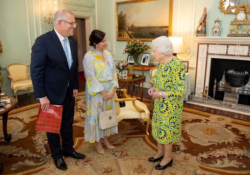 FILE PHOTO: Queen Elizabeth II meets Australian Prime Minister Scott Morrison and his wife Jennifer during a private audience at Buckingham Palace, in London, Britain June 4, 2019. Dominic Lipinski/Pool via REUTERS/File Photo