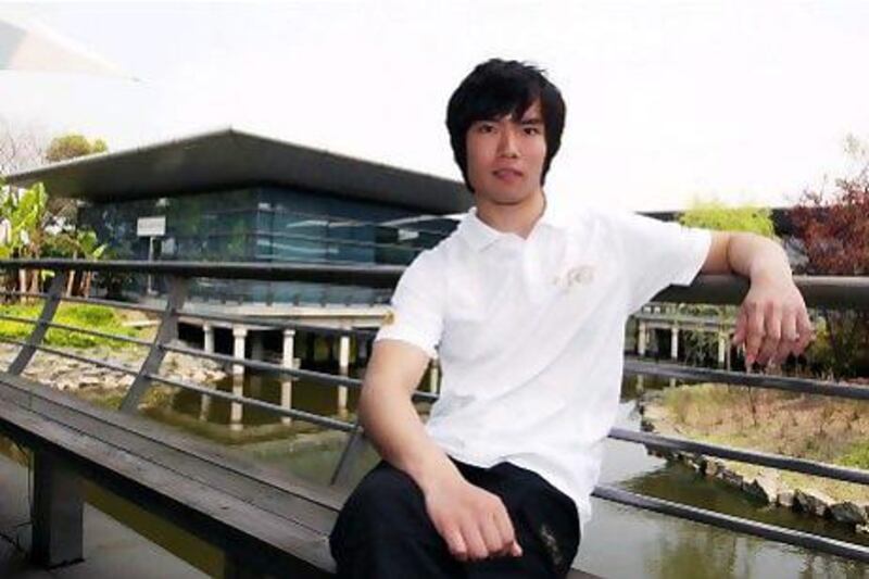Chinese F1 driver Ma Qing Hua.