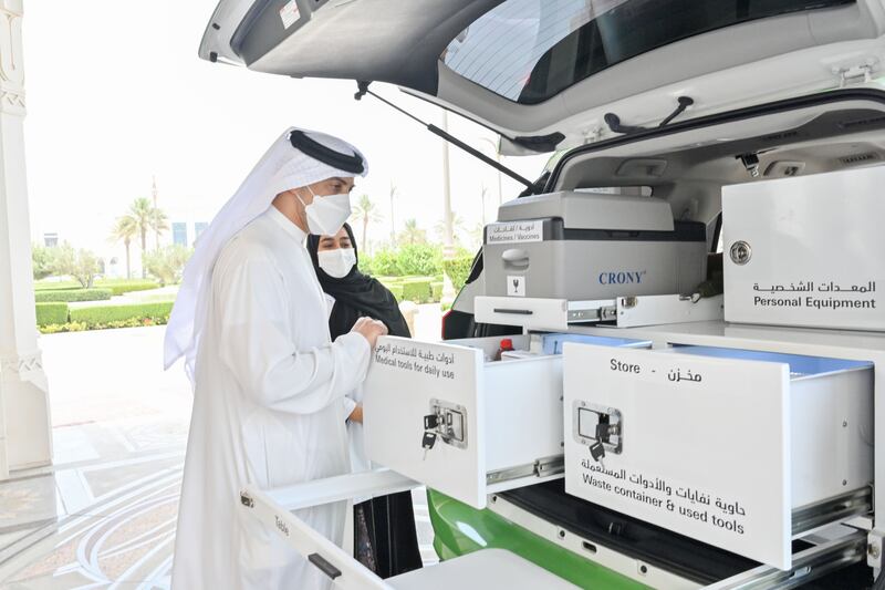 Sheikh Mansour inspects the mobile vans that are equipped with medicines, first aid, and vaccines for animals. 