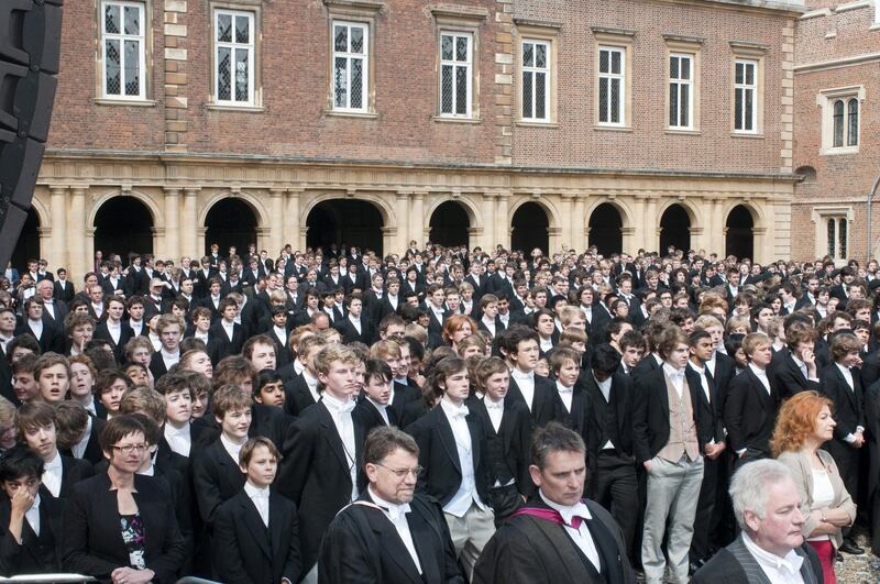 ETON, UNITED KINGDOM - MAY 27:   Eton pupils look on as Queen Elizabeth II and Prince Philip, Duke of Edinburgh attend the 150th Anniversary of the Eton Combined Cadet Force at Eton College on May 27, 2010 in Eton, United Kingdom.  (Photo by David Parker/WPA Pool/Getty Images)