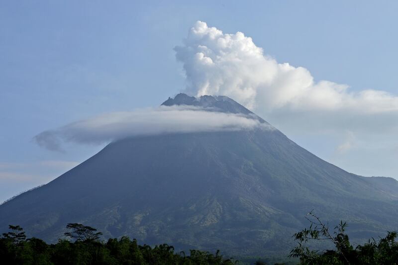 Mount Merapi spews volcanic steam from its crater seen from Sleman, Yogyakarta, Indonesia. AP Photo