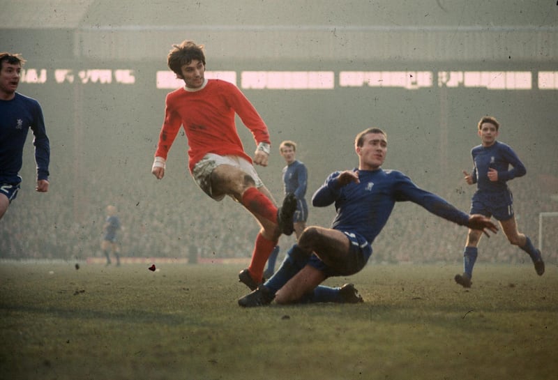 1971:  Chelsea's Ron Harris tackles Manchester United's George Best.  (Photo by A. Jones/Express/Getty Images)