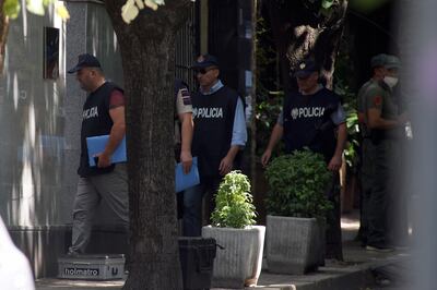Albanian police enter the Iranian Embassy in Tirana on Thursday. AP