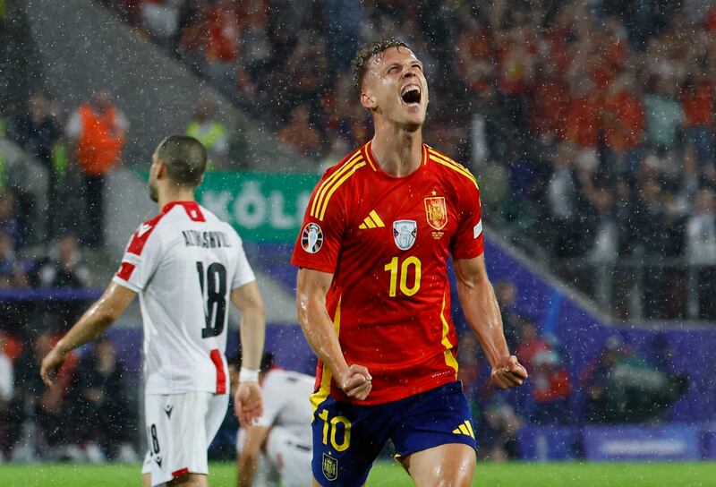 Spain's Dani Olmo celebrates scoring their fourth goal in the 4-1 Euro 2024 last-16 victory against Georgia in Cologne on Sunday, June 30, 2024. Reuters