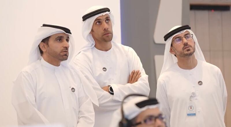 From left, Adnan Al Rais, project manager of Mars 2117,  MBRSC director general Salem Al Marri, and Hamad Obaid Al Mansoori, chairman of MBRSC, in the mission control room