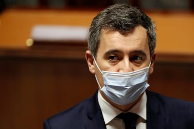 French Interior Minister Gerald Darmanin, wearing a protective face mask, attends the questions to the government session at the National Assembly in Paris amid the coronavirus disease (COVID-19) outbreak in France, January 26, 2021.  REUTERS/Gonzalo Fuentes
