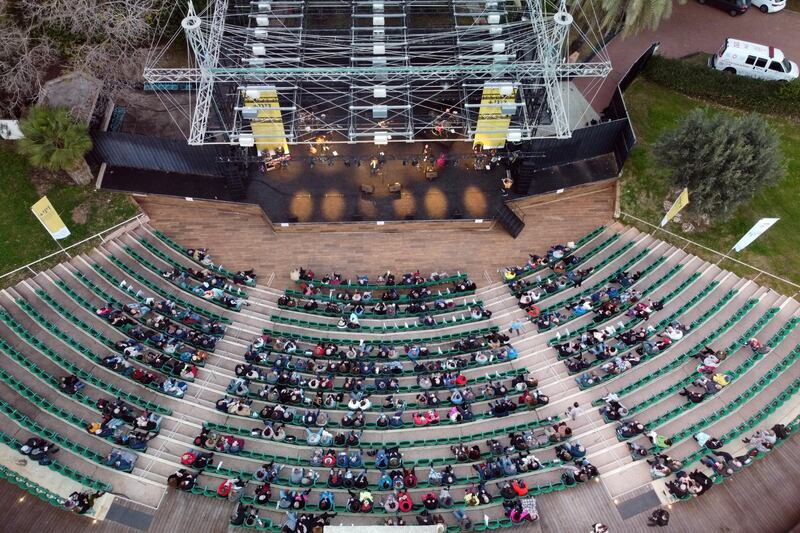 A concert by Israeli singer Nurit Galron is taking place for people with a "Green Pass", who are vaccinated against Covid-19 or those with presumed immunity, at Yarkon park, in Tel Aviv, Israel. Reuters