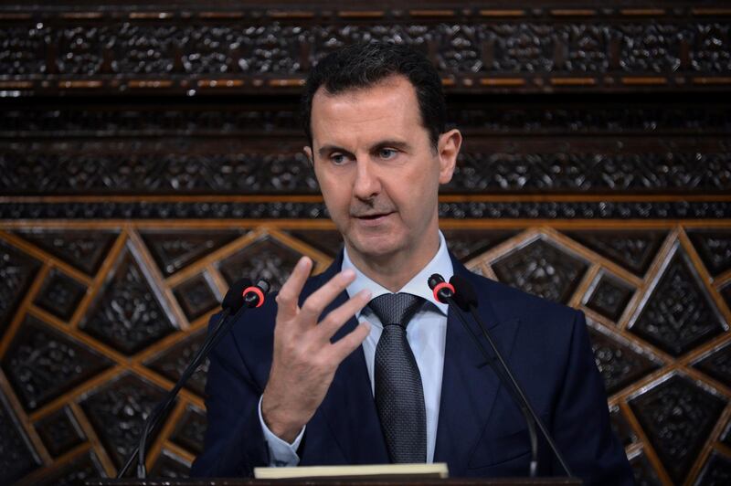 FILE - In this file photo released by the Syrian official news agency SANA, Syrian President Bashar Assad, addresses a speech to the newly-elected parliament at the parliament building, in Damascus, Syria, Tuesday, June 7, 2016. Like Syria, North Korea is on its way back onto a very short list of countries the United States says sponsor terrorism. The designation will expand the already substantial array of sanctions the U.S. has imposed on trade with North Korea. (SANA via AP, File)
