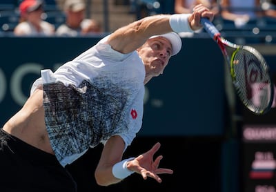 epa06941468 Kevin Anderson of South Africa in action against Grigor Dimitrov of Bulgaria during their quarterfinal match at the Rogers Cup Men's Tennis tournament in Toronto, Canada, 10 August 2018.  EPA/WARREN TODA