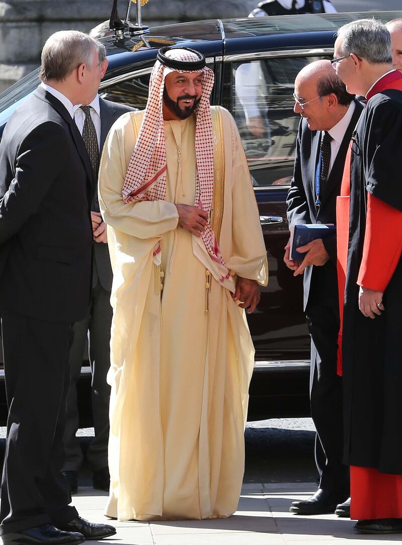 LONDON Wednesday 1st May 2013.  Sheikh Khalifa  is welcomed by Very Rev Dr.John Hall, Dean of Westminster (right) and Duke of York (left) as he arrives at Westminster Abbey in London, on the second day of his state visit, Wednesday 1st May 2013. Stephen Lock for The National