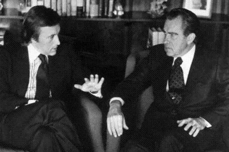 David Frost, left, talks with former US president Richard Nixon in this March 1977 photo prior to the taping of his interview.