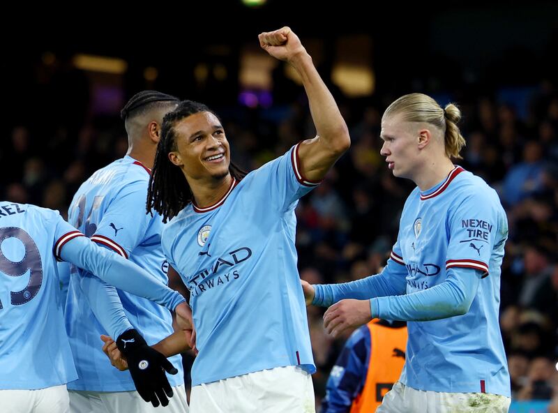 Soccer Football - FA Cup - Fourth Round - Manchester City v Arsenal - Etihad Stadium, Manchester, Britain - January 27, 2023 Manchester City's Nathan Ake celebrates scoring their first goal with teammates REUTERS / Molly Darlington