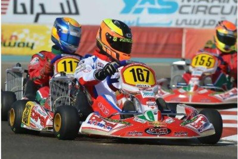 Track action for the Rotax Max Challenge Grand Finals began yesterday with practice. James Singleton, centre, the English driver, takes part in practice in the Junior Max class. Chris Walker / kartpix.net