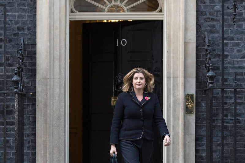 Leaving No 10 Downing Street after being appointed secretary of state for international development in November 2017. Getty Images