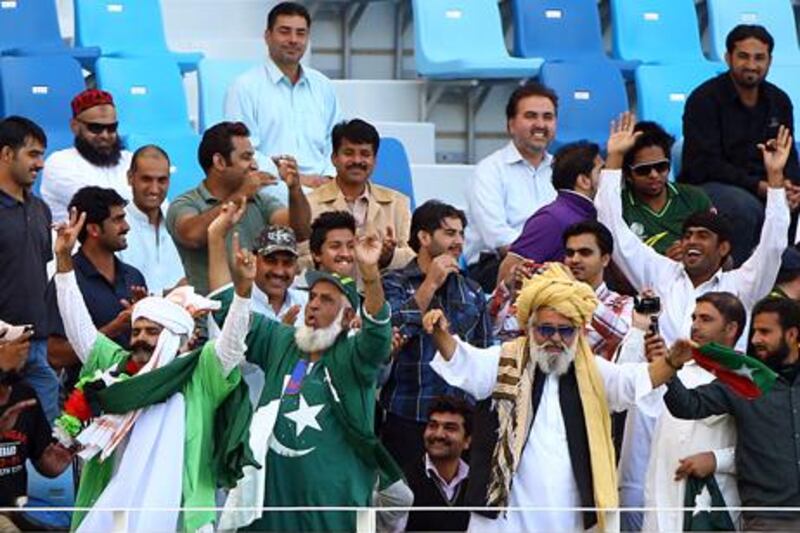 Pakistan fans at Dubai's International Cricket Stadium for the Test between Pakistan and England in January 2012.