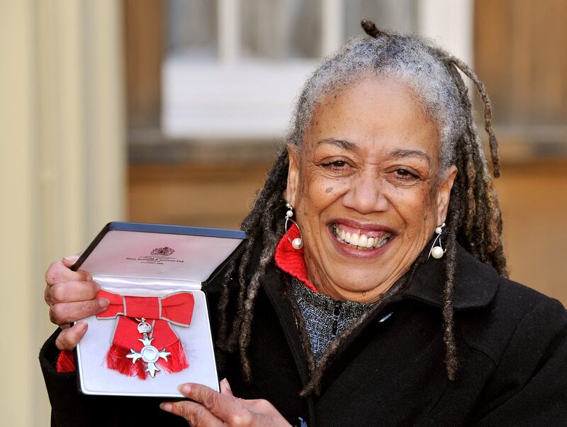 Jamaican poet Jean 'Binta' Breeze with her Member of the Order of the British Empire (MBE) medal, awarded for her services to literature. She died on August 4, 2021