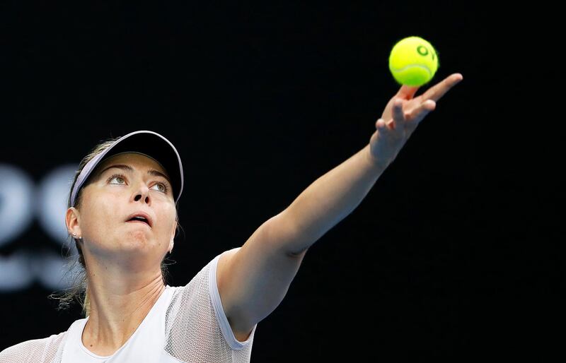 epa06456270 Maria Sharapova prepares to serve during her third round match against Angelique Kerber . Mast Irham / EPA