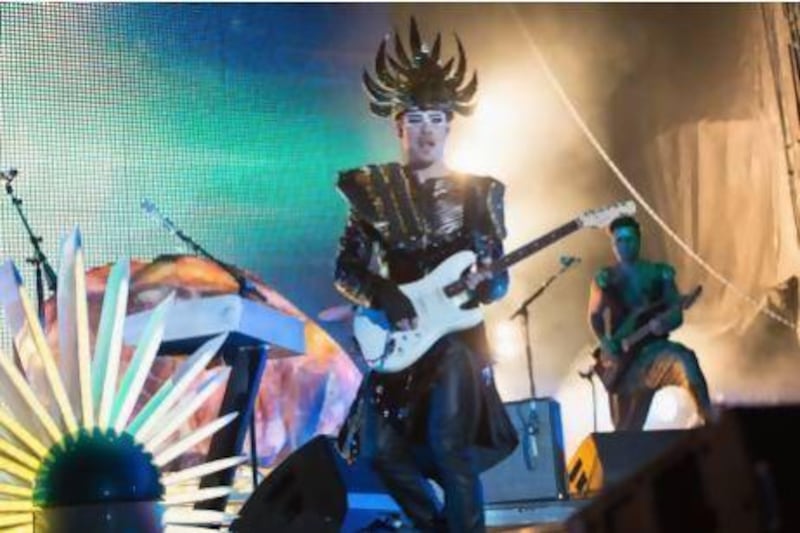 Luke Steele of Empire of the Sun, with headdress but without his touring-averse bandmate Nick Littlemore, performs last month at the 2013 Electric Daisy Carnival Chicago in Illinois. Daniel Boczarski / Getty Images