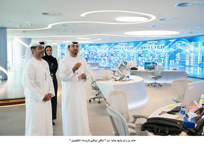 ABU DHABI, UNITED ARAB EMIRATES - November 11, 2018: HH Sheikh Hamed bin Zayed Al Nahyan, Chairman of the Crown Prince Court of Abu Dhabi and Abu Dhabi Executive Council Member (L), visits the 'Panorama' Artificial Intelligence and Big Data Centre at ADNOC HQ.

( Hamad Al Kaabi / Ministry of Presidential Affairs )?
---