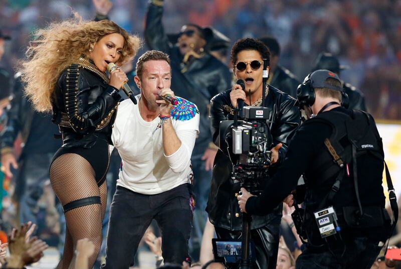 Beyonce, Chris Martin and Bruno Mars perform during the half-time show at the NFL's Super Bowl 50 between the Carolina Panthers and the Denver Broncos in Santa Clara, California February 7, 2016. Reuters