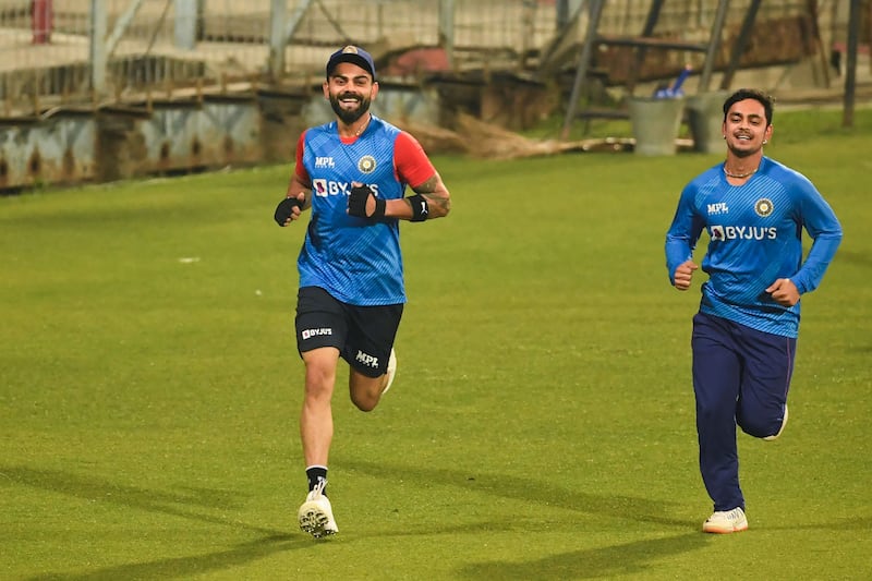 Virat Kohli, left, and Ishan Kishan during India's training session ahead of their first T20 against West Indies at the Eden Gardens in Kolkata. AFP