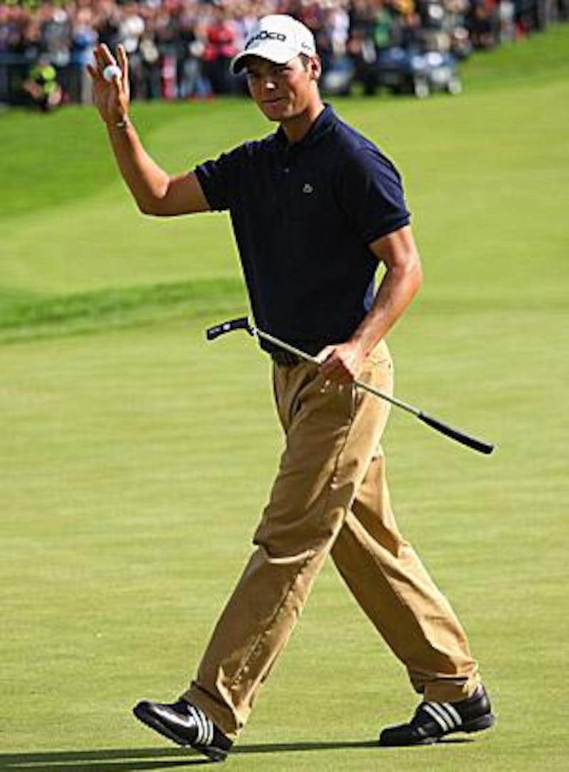 Martin Kaymer waves to the crowd at the 18th green after sealing his second successive victory on the European Tour at Loch Lomond.