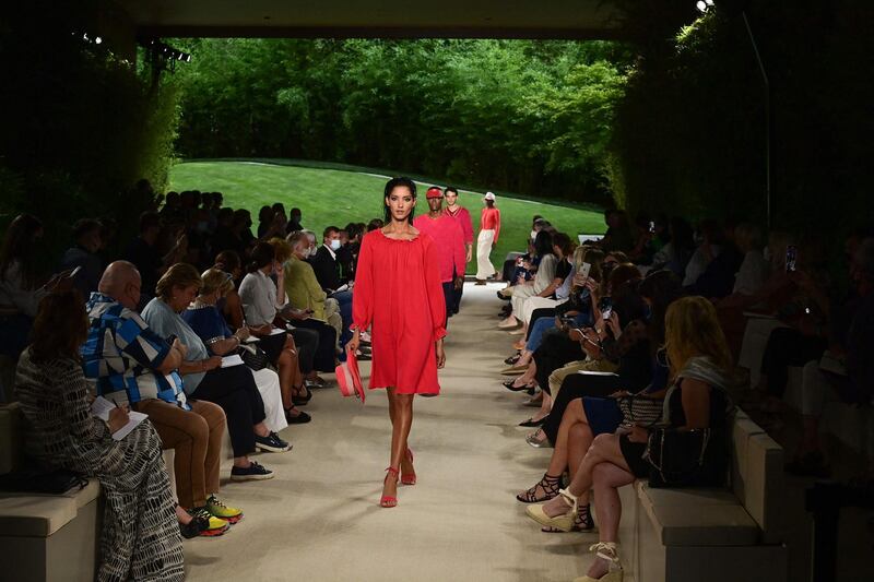 A model walks the runway during the Giorgio Armani show at Milan Men's Fashion Week on June 21, 2021 in Milan, Italy. AFP