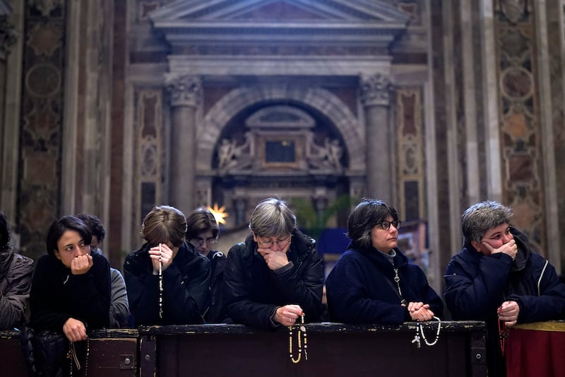 Mourners at St Peter's Basilica. Getty Images