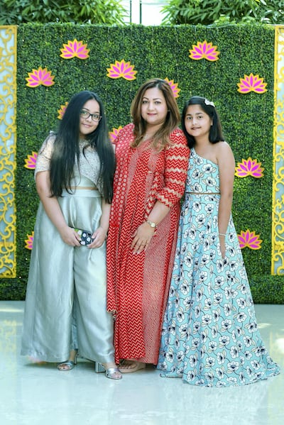 Anurradha Agaarwal, seen here with her daughters Riddhi and Anushka, hosts Modista exhibitions 